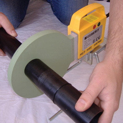 A fusion hot plate being used by a man.